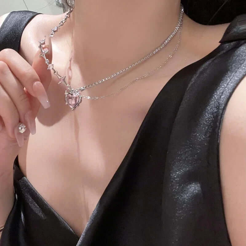 Elegant heart pendant necklace with crystal accents, layered chain design for women's fashion