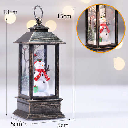 Christmas LED Flame Oil Lamp featuring a decorative snowman inside a lantern, 13cm tall, perfect for festive decor.