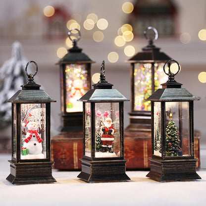 Christmas LED Flame Oil Lamp-style lanterns depicting Santa, snowman, and Christmas tree decorations.