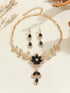 Vintage jewelry set featuring a black flower pendant necklace and matching earrings, designed with alloy and sparkling diamonds.