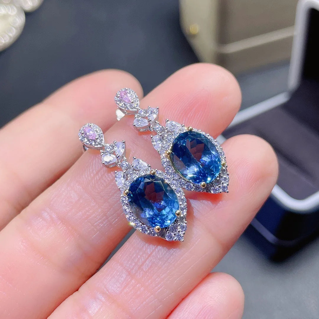 Sapphire Earrings in 925 Sterling Silver, featuring a stunning design with silver diamonds and royal blue stones.