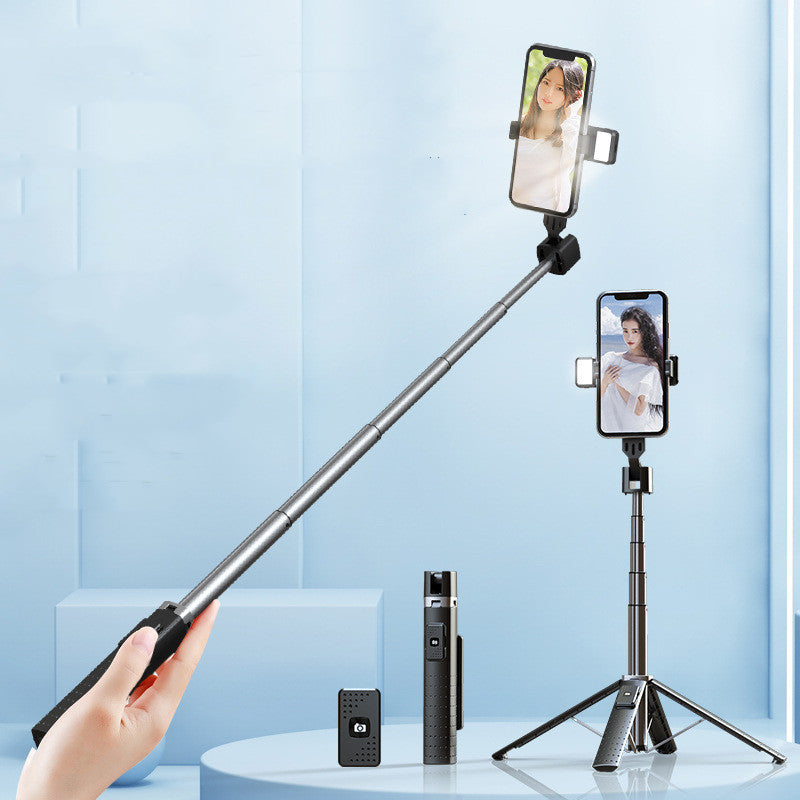 Bluetooth selfie stick with fill light showcasing a user holding the stick and a phone mounted on a tripod.